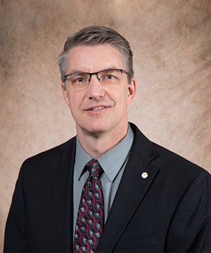 Norfolk Connections headshot photo - Dr. Leon Gebhardt